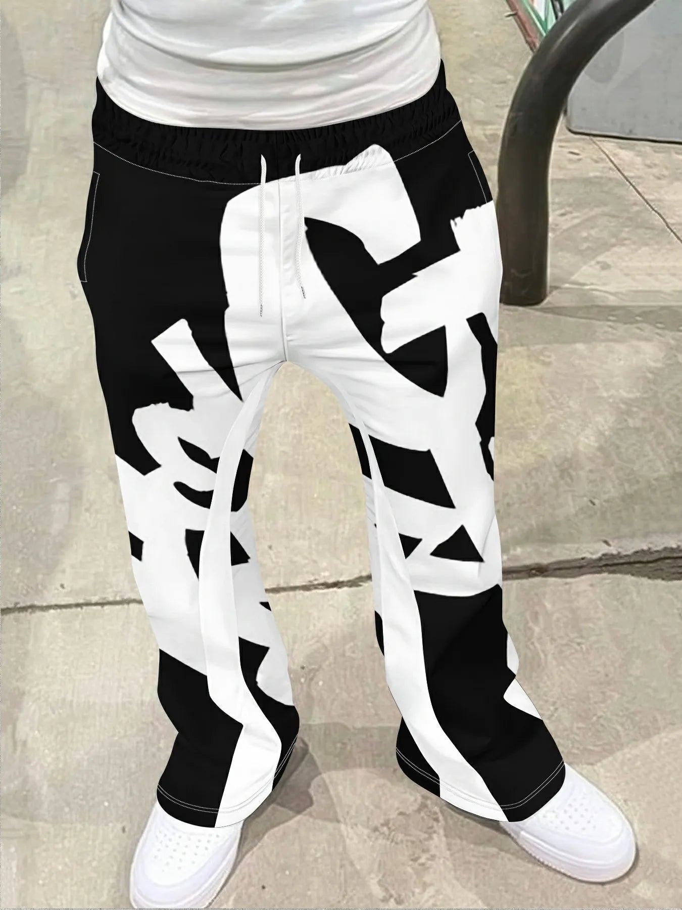 Men’s Black & White Cross Print Flared Sweatpants